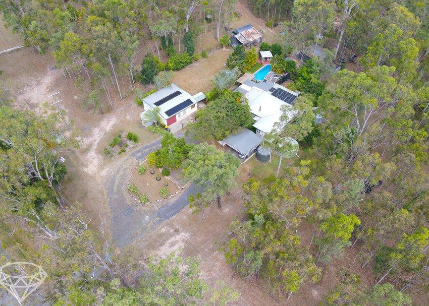 Escape to Serenity: Spacious 3 bed, 1 bath acreage in Apple Tree Creek. Privacy and tranquility await. Don't miss out! feature image