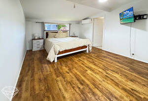 Live the ultimate Queensland lifestyle in this stunning 3 bedroom house with a pool, entertainment area, and rumpus room in Burnett Heads image 12