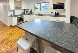 Live the ultimate Queensland lifestyle in this stunning 3 bedroom house with a pool, entertainment area, and rumpus room in Burnett Heads image 6