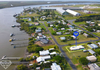 Live the ultimate Queensland lifestyle in this stunning 3 bedroom house with a pool, entertainment area, and rumpus room in Burnett Heads image 2