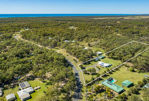 Luxury meets coastal living in this stunning 3-bed, 2-bath house in Moore Park Beach. Enjoy the pool, sheds, and study, with A/C for ultimate comfort. image 1