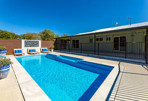 Luxury meets coastal living in this stunning 3-bed, 2-bath house in Moore Park Beach. Enjoy the pool, sheds, and study, with A/C for ultimate comfort. image 3