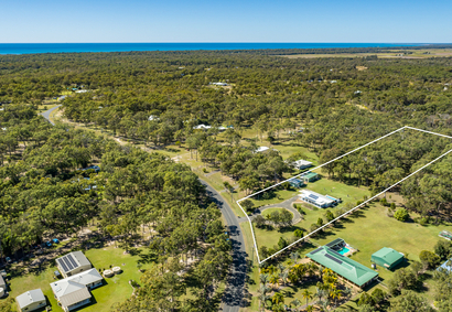 Thumbnail: Luxury meets coastal living in this stunning 3-bed, 2-bath house in Moore Park Beach. Enjoy the pool, sheds, and study, with A/C for ultimate comfort.