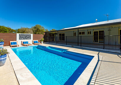 Luxury meets coastal living in this stunning 3-bed, 2-bath house in Moore Park Beach. Enjoy the pool, sheds, and study, with A/C for ultimate comfort. image 3