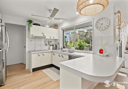The Perfect Robina Escape: Family-Friendly Design with Pool and Privacy image 3