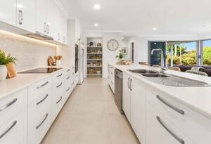 A Flexible Five-Bedroom Coastal Home Designed for Two Families image 3